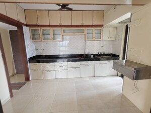 Kitchen in 2 BHK Apartment at Jasmine Tower, Vasant Vihar – for Rent