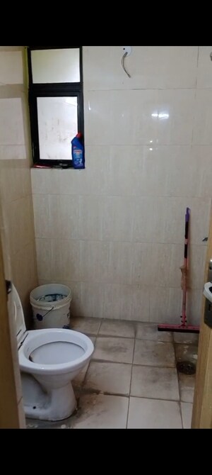 Bathroom in 1 BHK Apartment at Devika Skypers, Raj Nagar Extension – for Sale