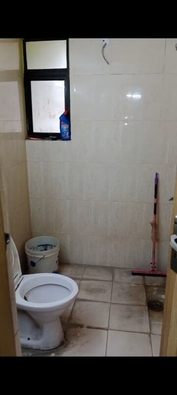 Bathroom in 1 BHK Apartment at Devika Skypers, Raj Nagar Extension – for Sale