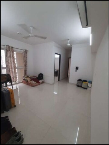 Living Room in 2 BHK Apartment at Lodha Amara, Kolshet Road – for Sale