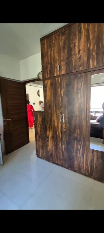 Bedroom in 2 BHK Apartment at Nivara Deepanjali CHSL, Vile Parle East – for Rent