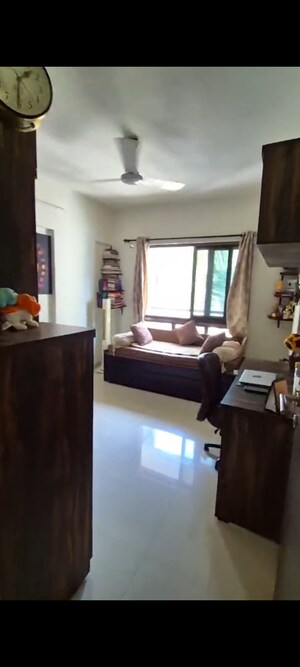Bedroom in 2 BHK Apartment at Nivara Deepanjali CHSL, Vile Parle East – for Rent