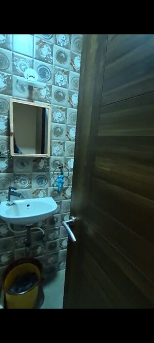 Bathroom in 2 BHK Apartment at Nivara Deepanjali CHSL, Vile Parle East – for Rent