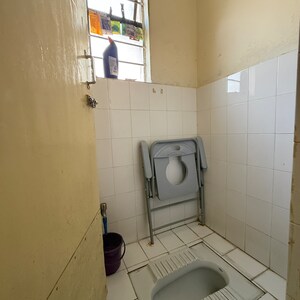 Bathroom in 1 BHK Apartment at Vardayini Society, Sutarwadi – for Rent