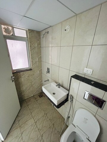 Bathroom in 3 BHK Apartment at Godrej Green Cove, Mahalunge – for Rent