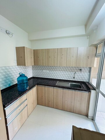 Kitchen in 3 BHK Apartment at Godrej Green Cove, Mahalunge – for Rent