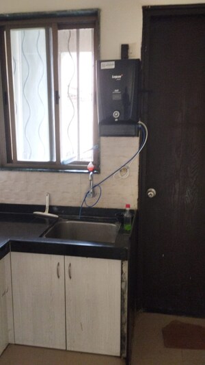 Kitchen in 2 BHK Apartment at Kumar Urban Kul Ecoloch, Mahalunge – for Rent