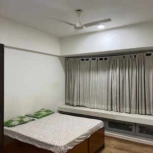 Bedroom in 2 BHK Apartment at Amar Kunj Goregaon West, Unnat Nagar – for Rent