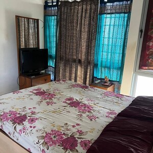 Bedroom in 2 BHK Apartment at Amar Kunj Goregaon West, Unnat Nagar – for Rent