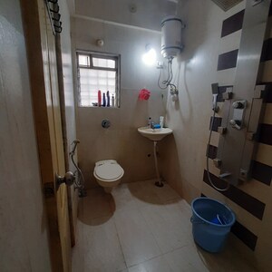 Bathroom in 2 BHK Apartment at Cosmos Heritage, Kokanipada – for Rent