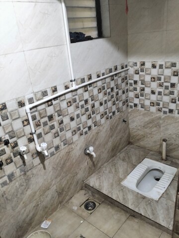 Bathroom in 1 BHK Apartment at JMD Enclave, Nibm – for Rent