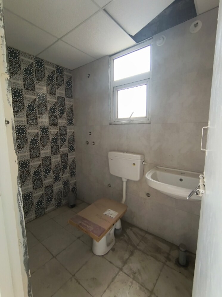 Bathroom, signature-the-millennia-3 2 Bedroom 661 Sq.Ft. Apartment In Sector 37d Gurgaon 9385007