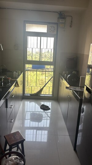 Kitchen in 2 BHK Apartment at Godrej Tranquil, Kandivali East – for Sale