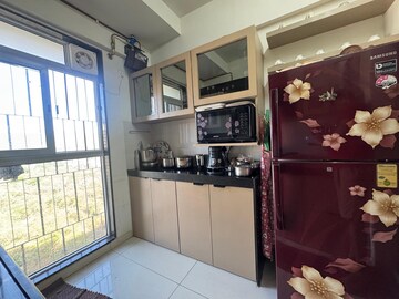 Kitchen in 2 BHK Apartment at Godrej Tranquil, Kandivali East – for Sale