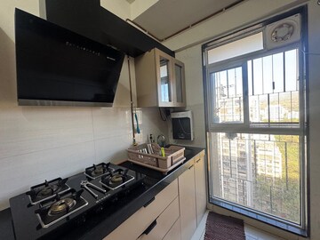 Kitchen in 2 BHK Apartment at Godrej Tranquil, Kandivali East – for Sale