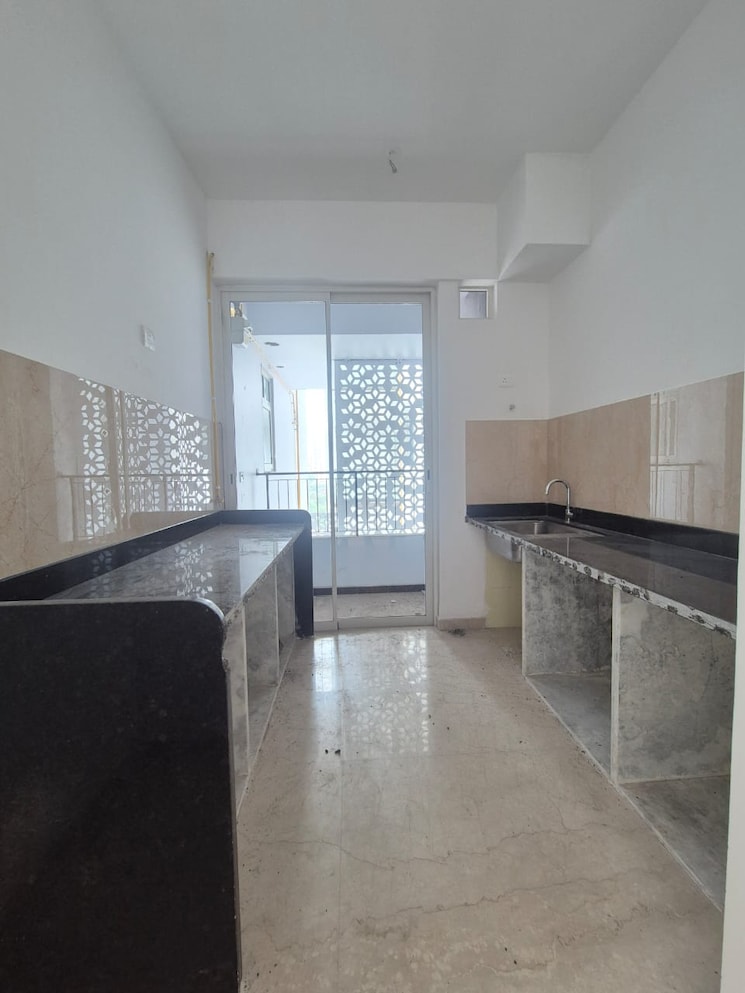 Kitchen, courtyard-by-narang-realty-and-the-wadhwa-group 2 Bedroom 830 Sq.Ft. Apartment In Pokhran Road No Two Thane 9385008