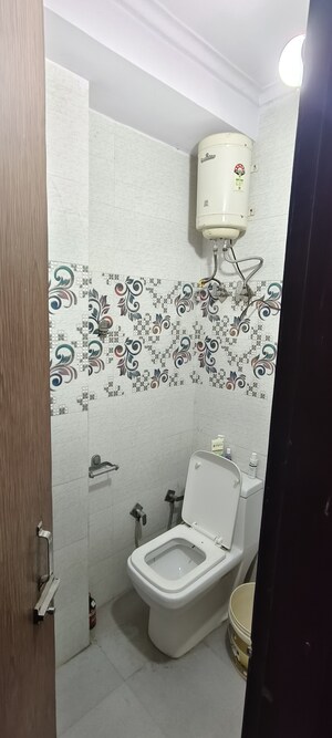 Bathroom in 2 BHK Builder Floor at Dwarka Mor – for Rent