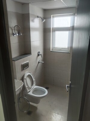 Bathroom in 3 BHK Apartment at Adore Happy Homes, Sector 86 – for Sale