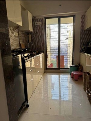 Kitchen in 3 BHK Apartment at New India Grace Luxuria, Malad West – for Rent