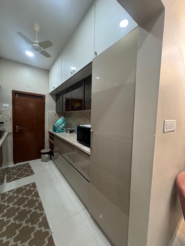 Kitchen, amigo-united-avenues 3 Bedroom 1715 Sq.Ft. Apartment In Narsingi Hyderabad 9385453