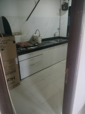 Kitchen in 3 BHK Apartment at Vijaynagar Society, Marol – for Rent