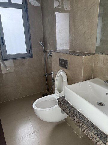 Bathroom in 3 BHK Apartment at Sunteck City Avenue 4, Goregaon West – for Rent