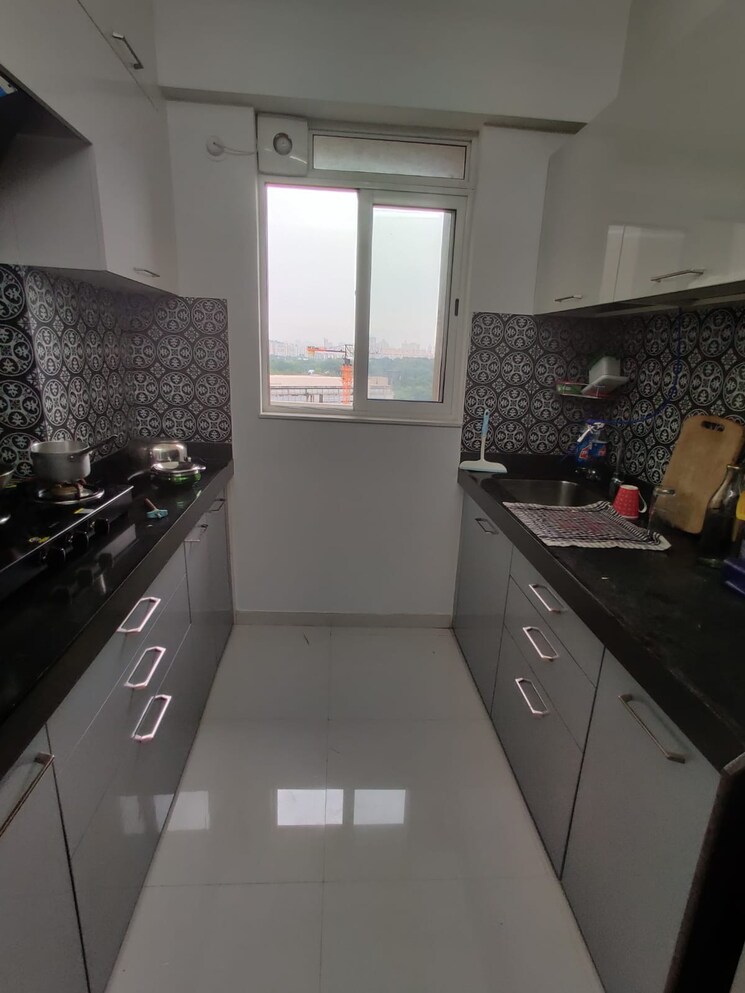 Kitchen, lodha-amara 3 Bedroom 955 Sq.Ft. Apartment In Kolshet Road Thane 9345443