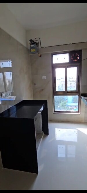 Team Area in 1 BHK Apartment at Jeevan Tara CHS, Vile Parle East – for Rent