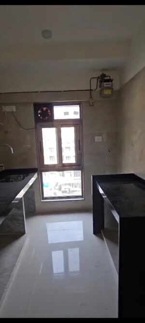 Kitchen in 1 BHK Apartment at Jeevan Tara CHS, Vile Parle East – for Rent