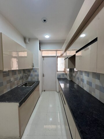 Kitchen in 3 BHK Apartment at Pareena Express Heights, Sector 99 – for Rent