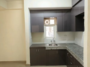 Kitchen in 2 BHK Apartment at Central Park Cerise Suites, Sohna Sector 33 – for Sale