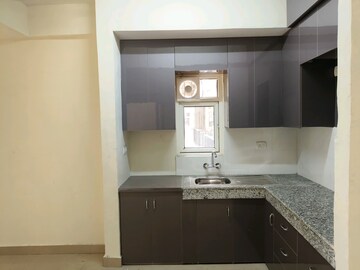 Kitchen in 2 BHK Apartment at Central Park Cerise Suites, Sohna Sector 33 – for Sale