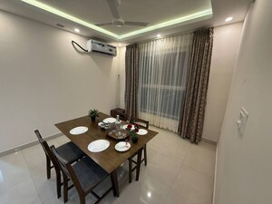 Dining area in 3 BHK Apartment at Pashmina Waterfront, Old Madras Road – for Rent