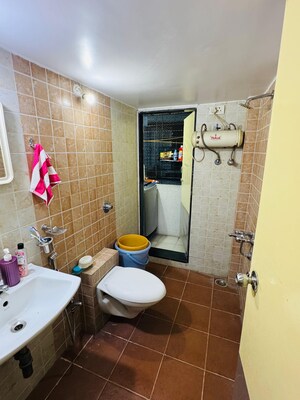 Bathroom in 2 BHK Apartment at Raunak Viraj Tower , Pokhran Road No Two – for Rent