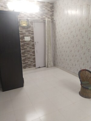 Living Room in 1.5 BHK Apartment at Nehru Enclave – for Rent