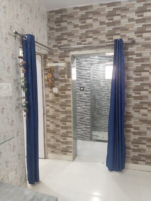 Building Lobby in 1.5 BHK Apartment at Nehru Enclave – for Rent