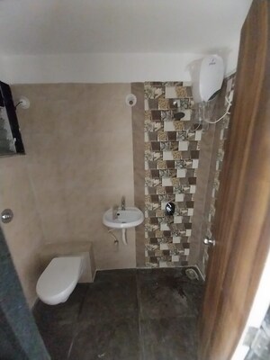 Bathroom in 3 BHK Apartment at Galaxy Green Woods, Kharghar – for Rent