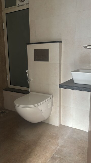 Bathroom in 2 BHK Apartment at Omkar Signet, Malad East – for Rent