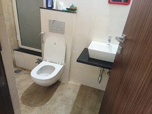 Bathroom in 2 BHK Apartment at Omkar Signet, Malad East – for Rent