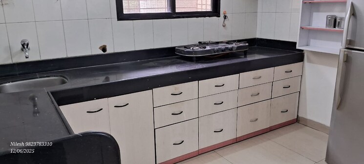 Kitchen, pooja-enclave 2 Bedroom 875 Sq.Ft. Apartment In Karve Nagar Pune 9386387