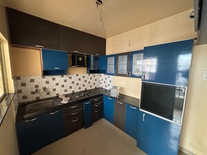 Kitchen in 2 BHK Apartment at Diamond White Stone, Wagholi – for Rent