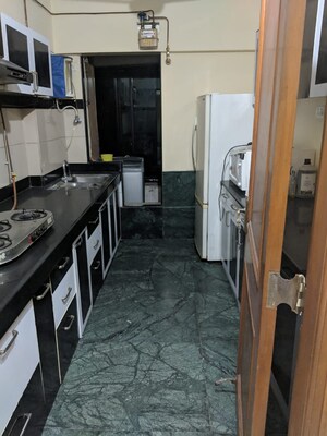 Kitchen in 2 BHK Apartment at Vanamali CHS, Chembur – for Rent