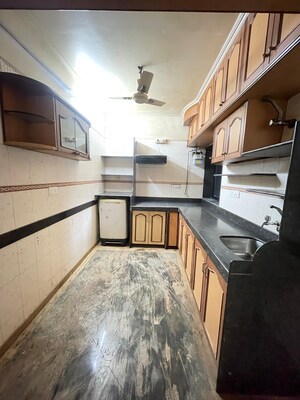 Kitchen in 3 BHK Apartment at Lokhandwala Whispering Palms XXclusives, Kandivali East – for Rent