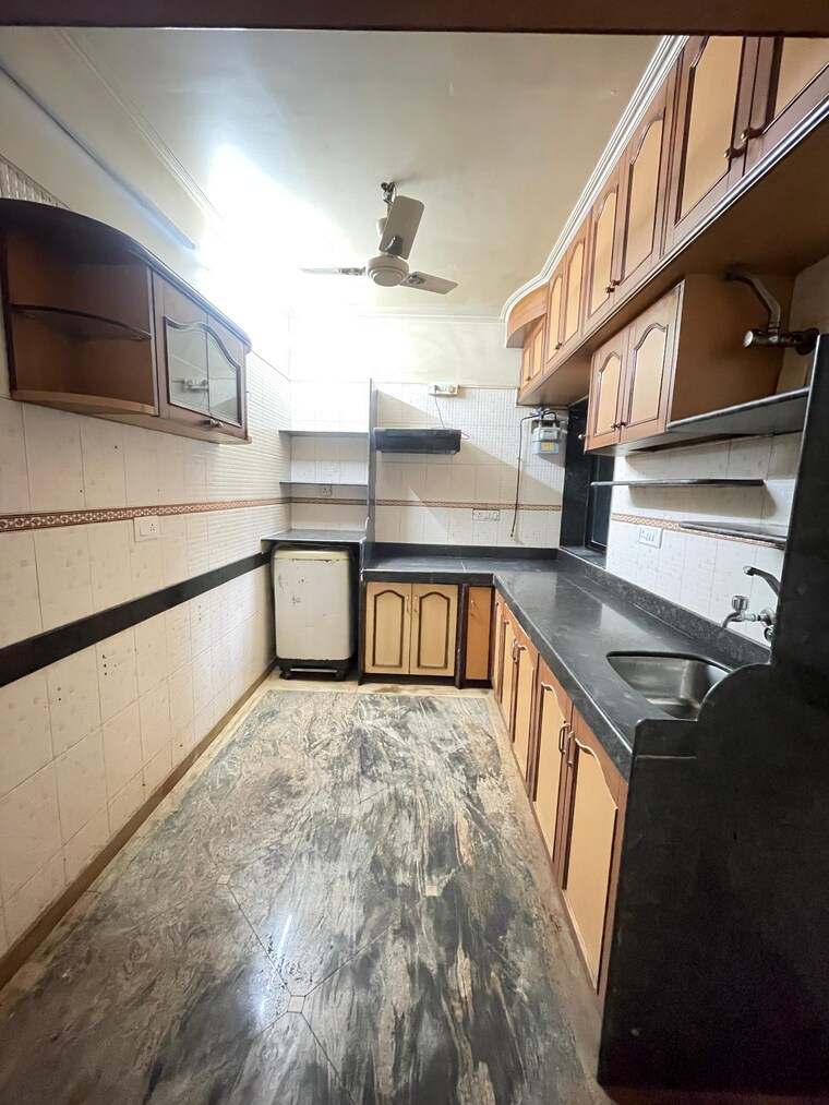 Kitchen, lokhandwala-whispering-palms-xxclusives 3 Bedroom 1660 Sq.Ft. Apartment In Kandivali East Mumbai 9386418