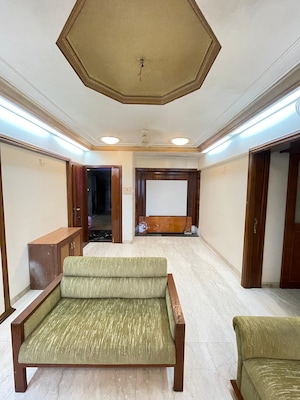 Living Room in 3 BHK Apartment at Lokhandwala Whispering Palms XXclusives, Kandivali East – for Rent