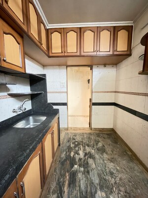 Kitchen in 3 BHK Apartment at Lokhandwala Whispering Palms XXclusives, Kandivali East – for Rent