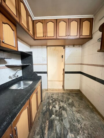 Kitchen in 3 BHK Apartment at Lokhandwala Whispering Palms XXclusives, Kandivali East – for Rent