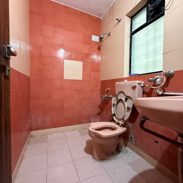 Bathroom in 2 BHK Apartment at Bhansali Whispering Winds, Link Road – for Rent