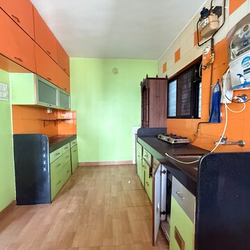 Kitchen in 2 BHK Apartment at Bhansali Whispering Winds, Link Road – for Rent