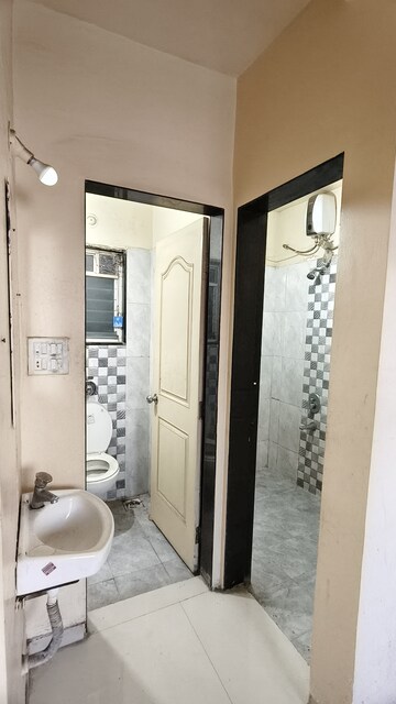 Bathroom in 1 BHK Apartment at Wadgaon Sheri – for Rent